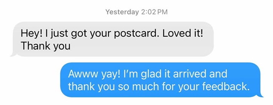 A text from someone on the list saying they just got the postcard and loved it